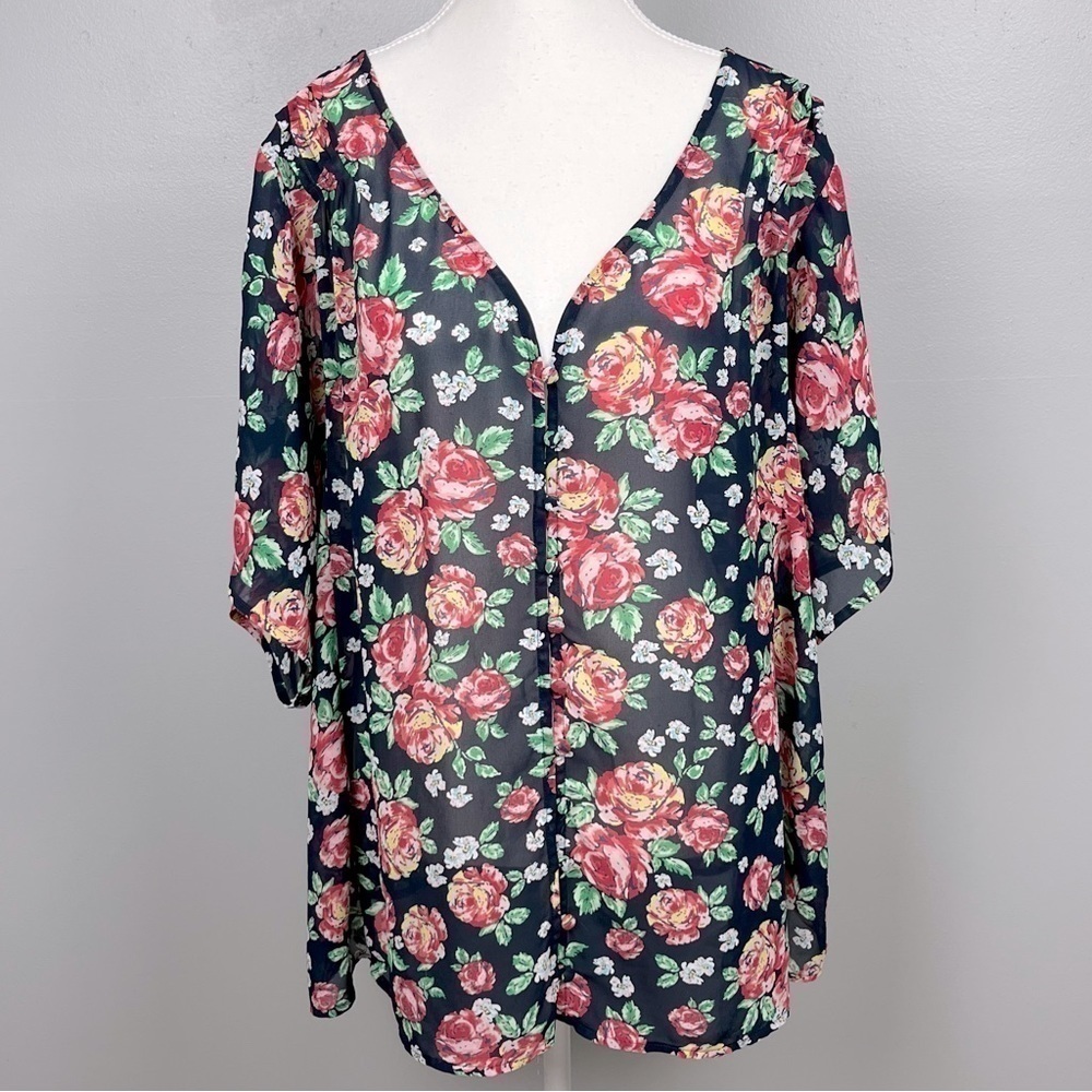 Torrid sheer button front black with floral print blouse, size 3X.